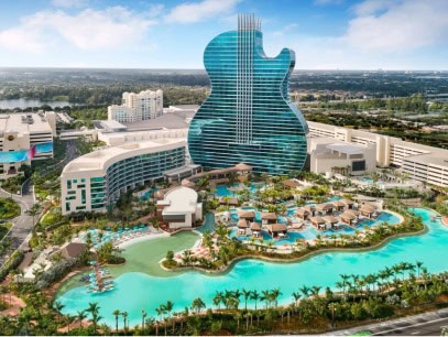 Resort with guitar-shaped building and lagoon pool.